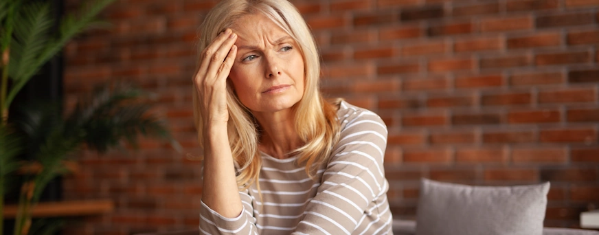 Life Assure Woman Thinking Seriously Staring In Distance Hero.
